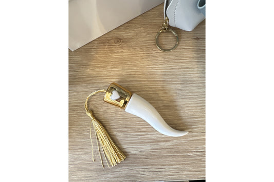Corno bianco e oro in porcellana misura 11 cm